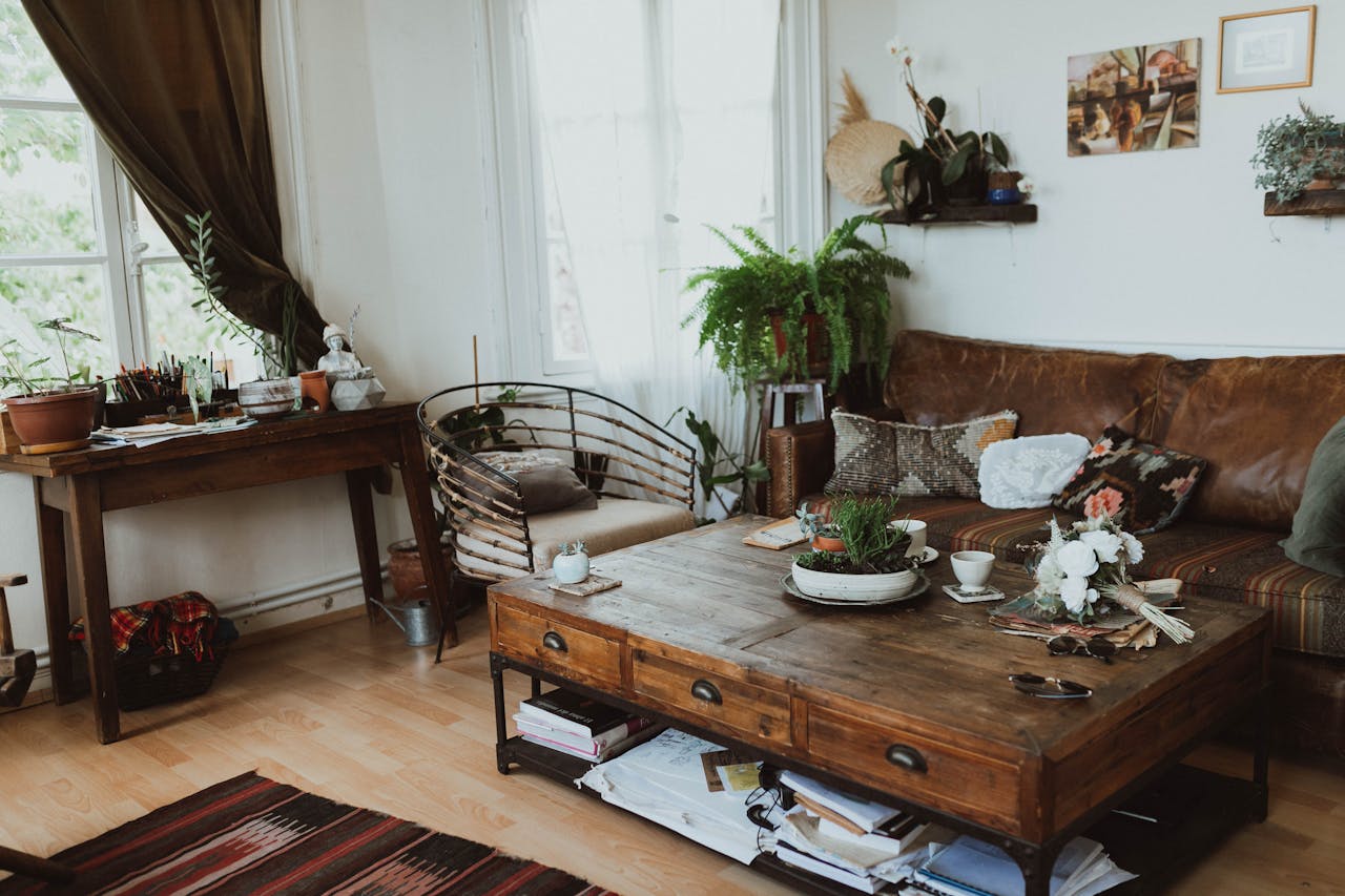 services-01 A cozy living room with vintage furniture, rustic decor, and indoor plants creating a warm ambiance.